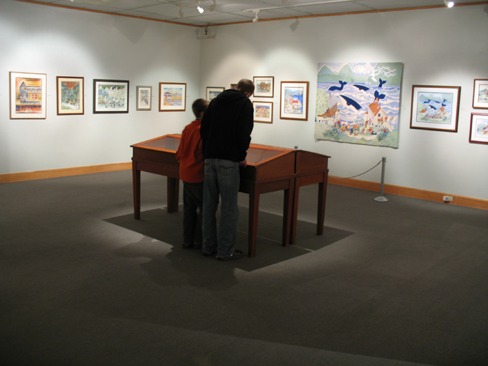 The boys are looking at art