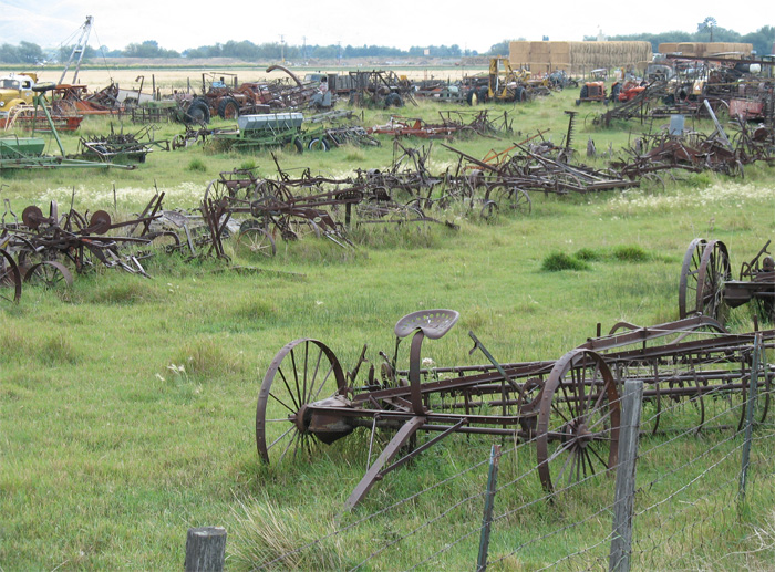 Graveyard for old farm equipment in Baker City, OR