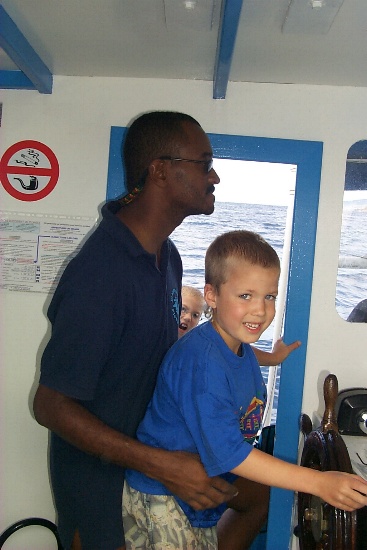Karl gets to drive the dive boat