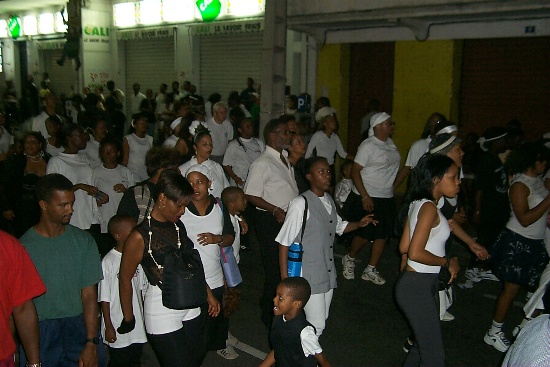 Crowds of people dressed in black and white