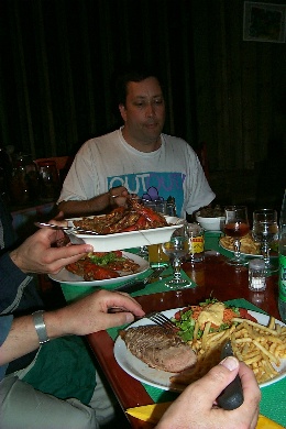 Barry biting into the very good food