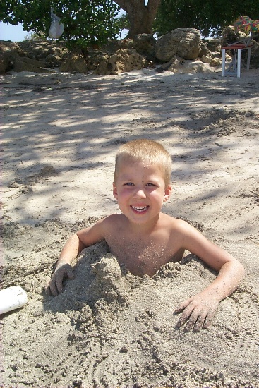 Karl is up to the chest in sand