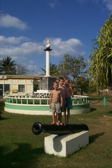 Karl, Gaetan and Erik posing by the Christopher Columbus monument