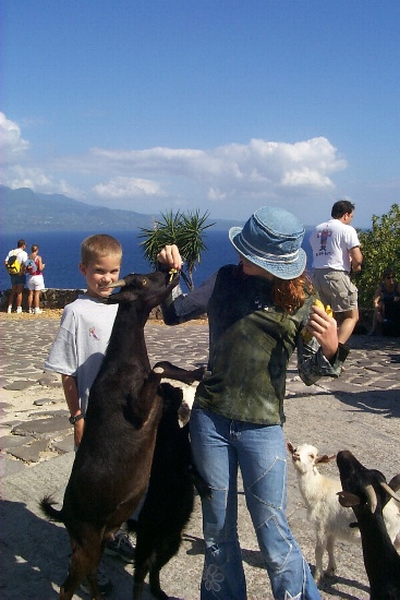 Isabelle feeding the goats
