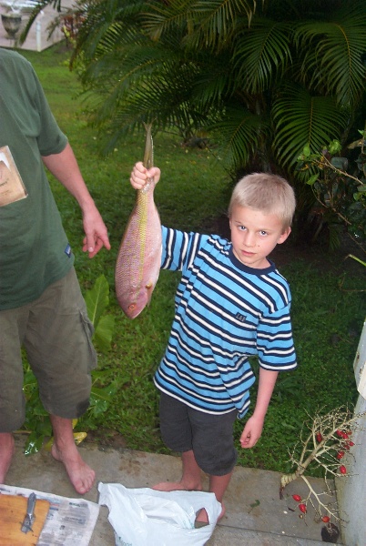 Lucas holds up the fish Bengt and I bought at the market