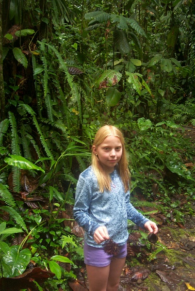 Louise finds big seeds in the bushes