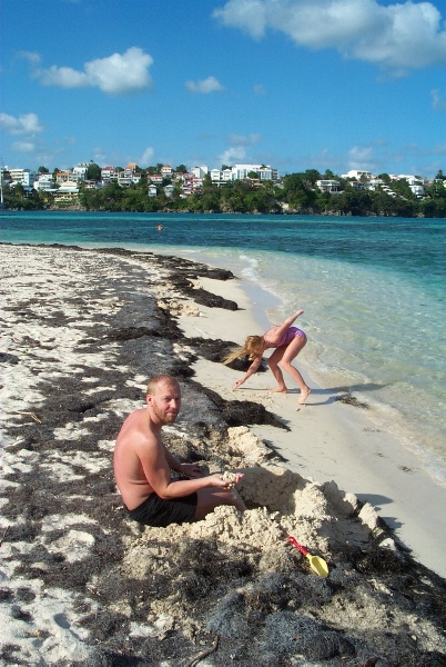 Bengt helping the kids dig in the sand