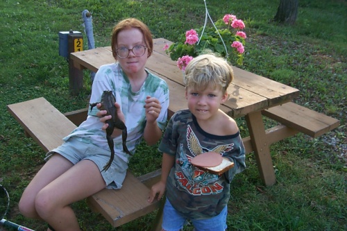 Izzy posing with frog